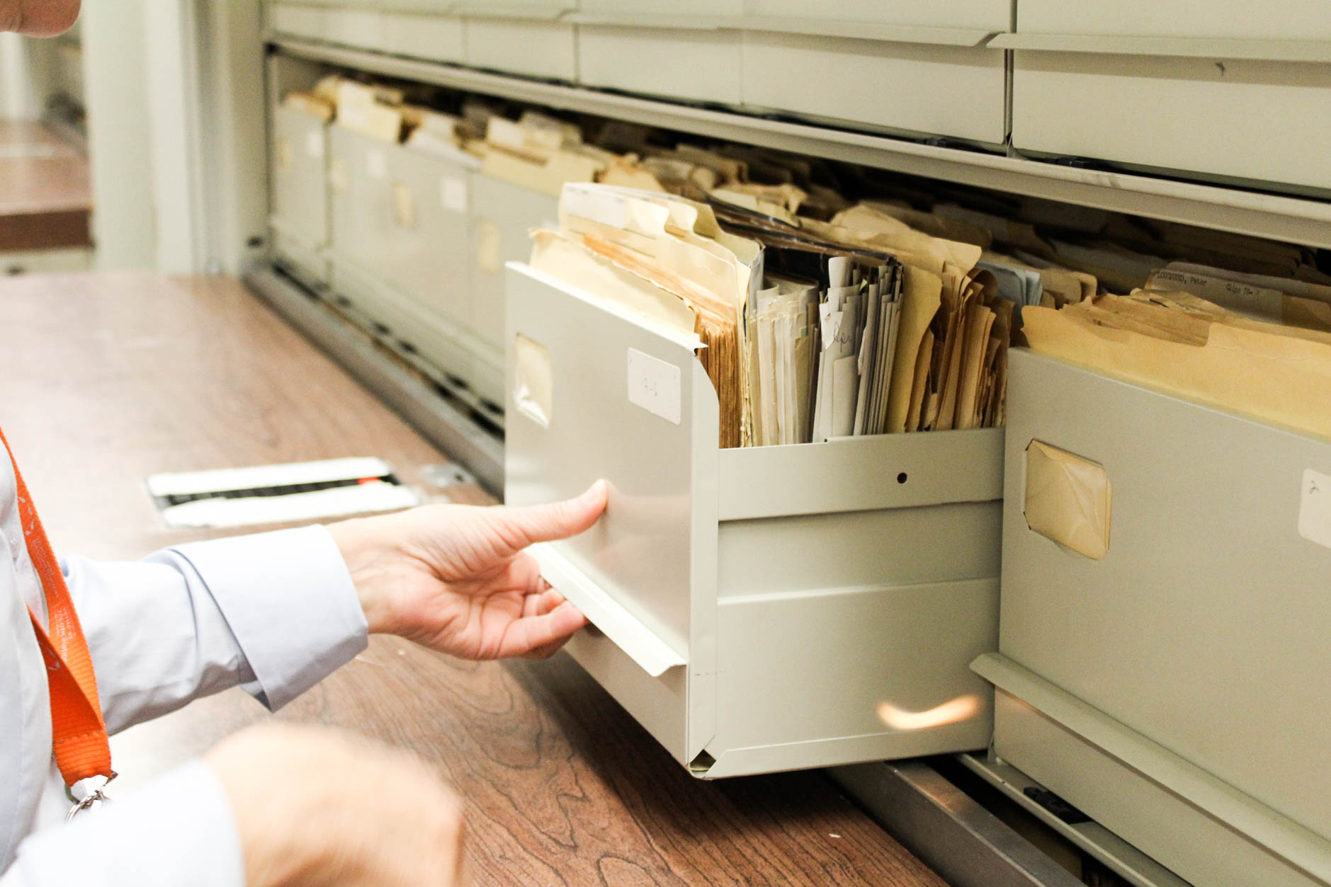 Shelley Sweeney opening file cabinet